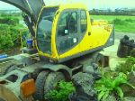 Экскаватор колесный Volvo EW170 2003 г